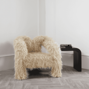 Freyj ivory chair styled in the corner of a grand room