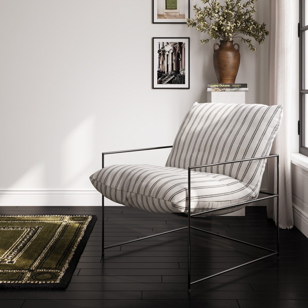 stylish pinstripe armchair in the corner of a monochrome room 